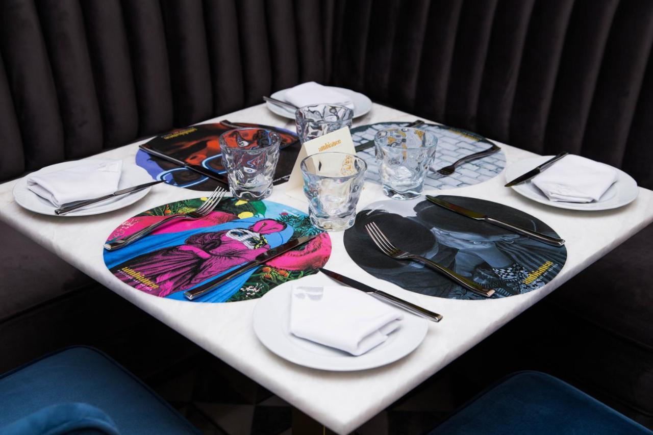 Ambiance Boutique Art Hotel Lahore Exterior foto Placemats