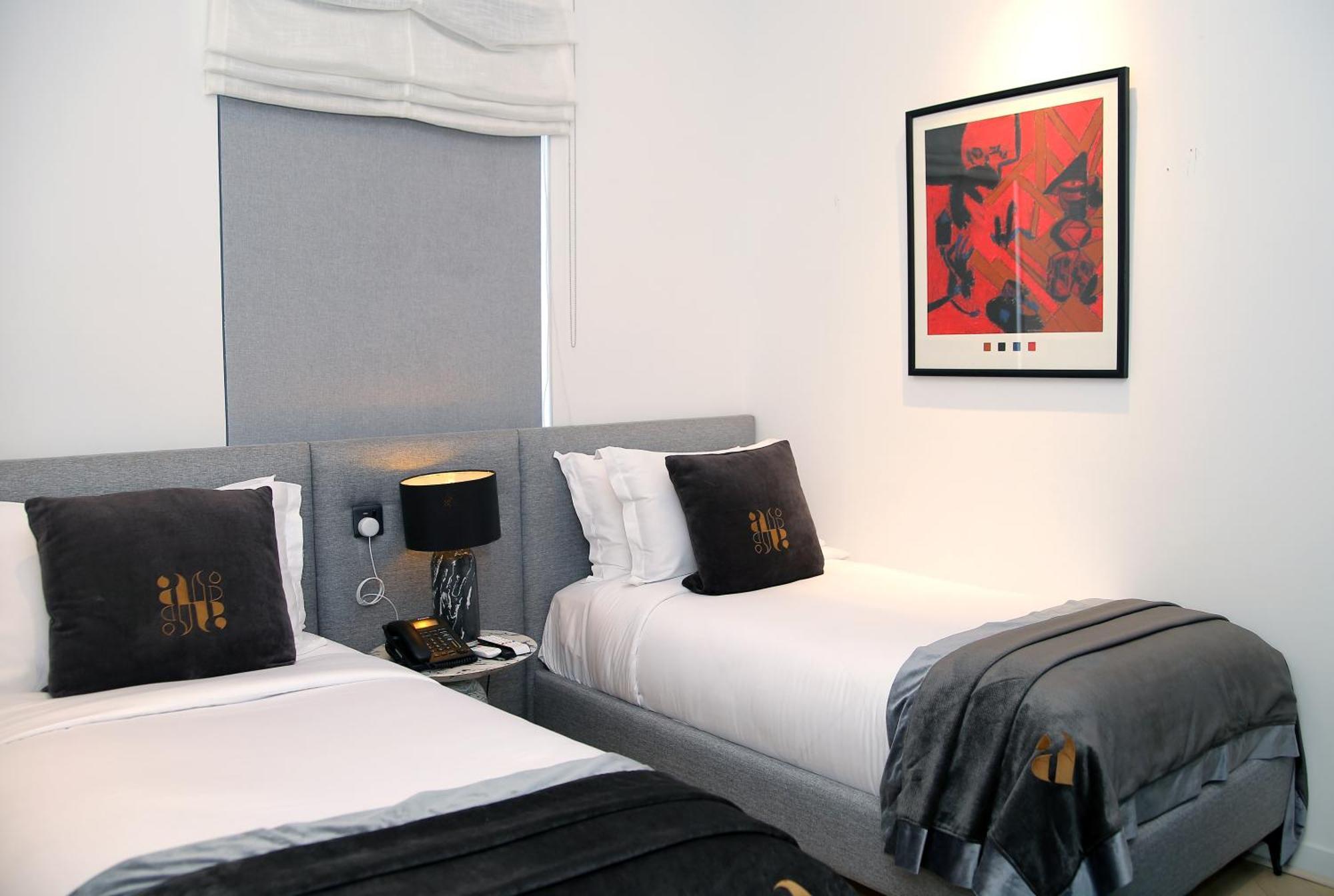 Ambiance Boutique Art Hotel Lahore Quarto foto A bedroom at the hotel